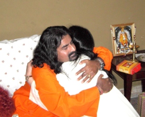 Mohanji being hugged, Oct 09