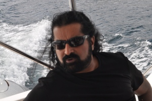 Mohanji in a boat