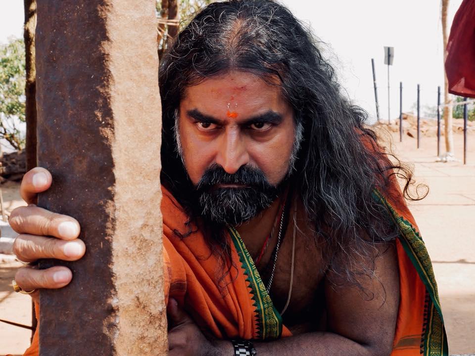 pkmohan - Mohanji - Atmananda - Mohanji at Mookambika Kudajadri mountain holding Mother's spear.jpg