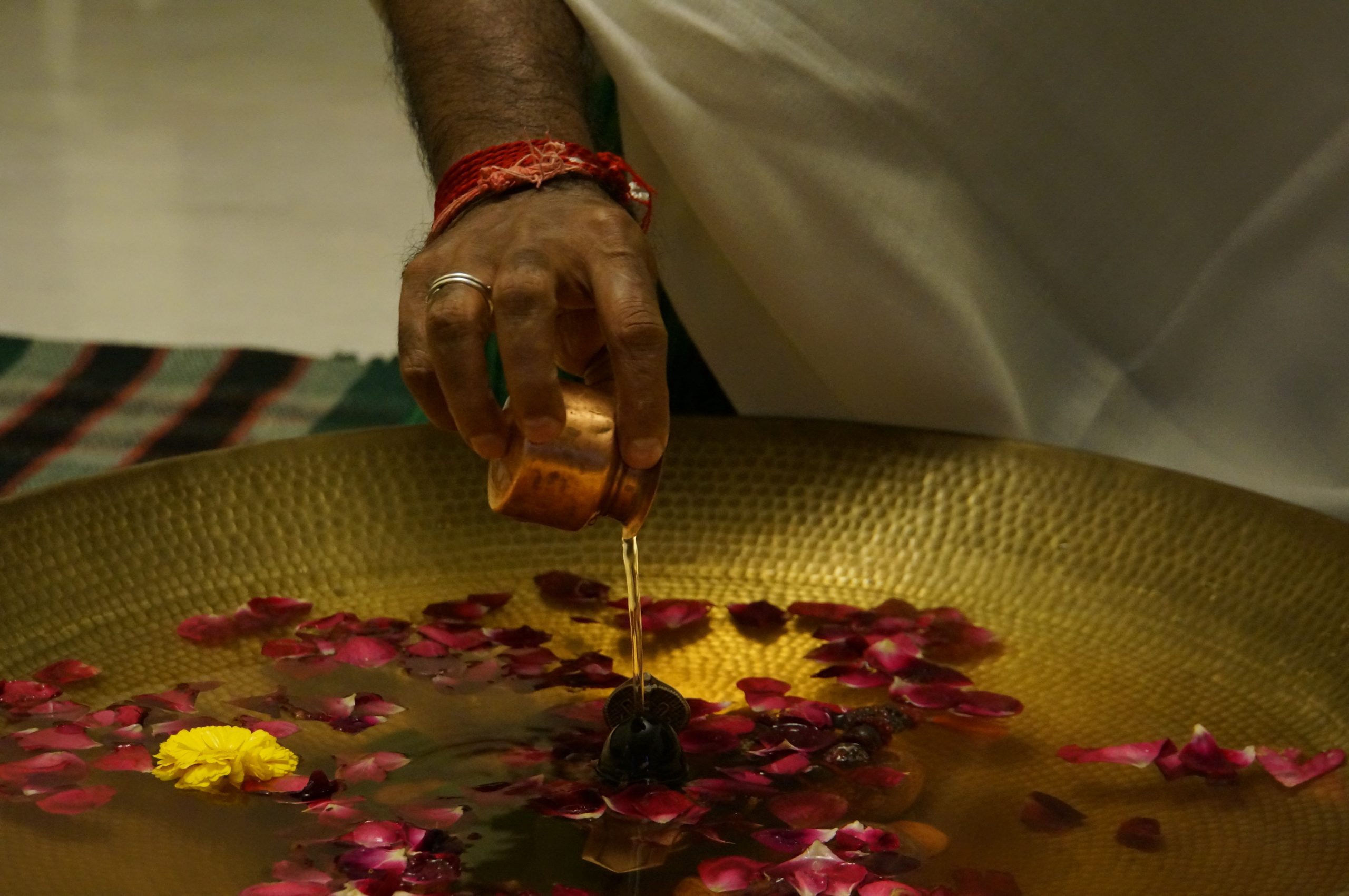 Mohanji doing shiva lingam abishek