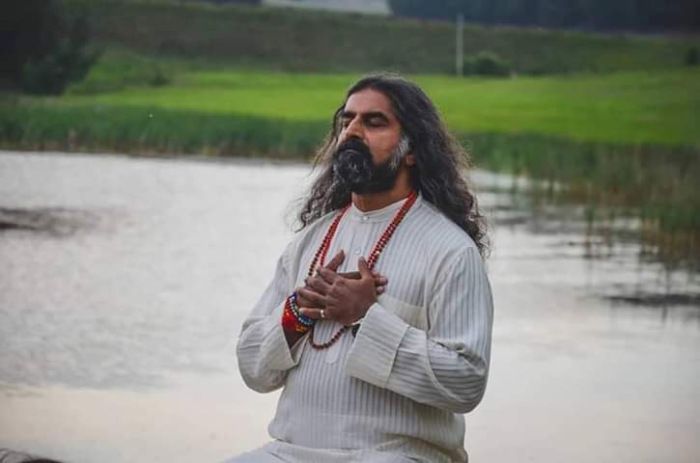 Photograph of Mohanji praying